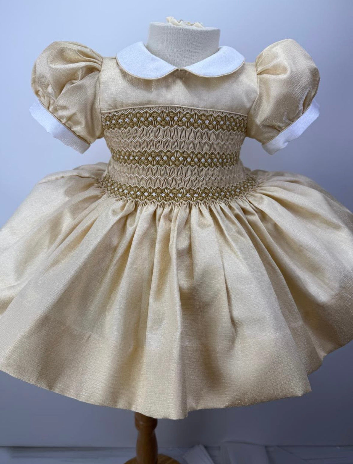 Pre order due in 20th September.                         Gold shimmer smock back & front