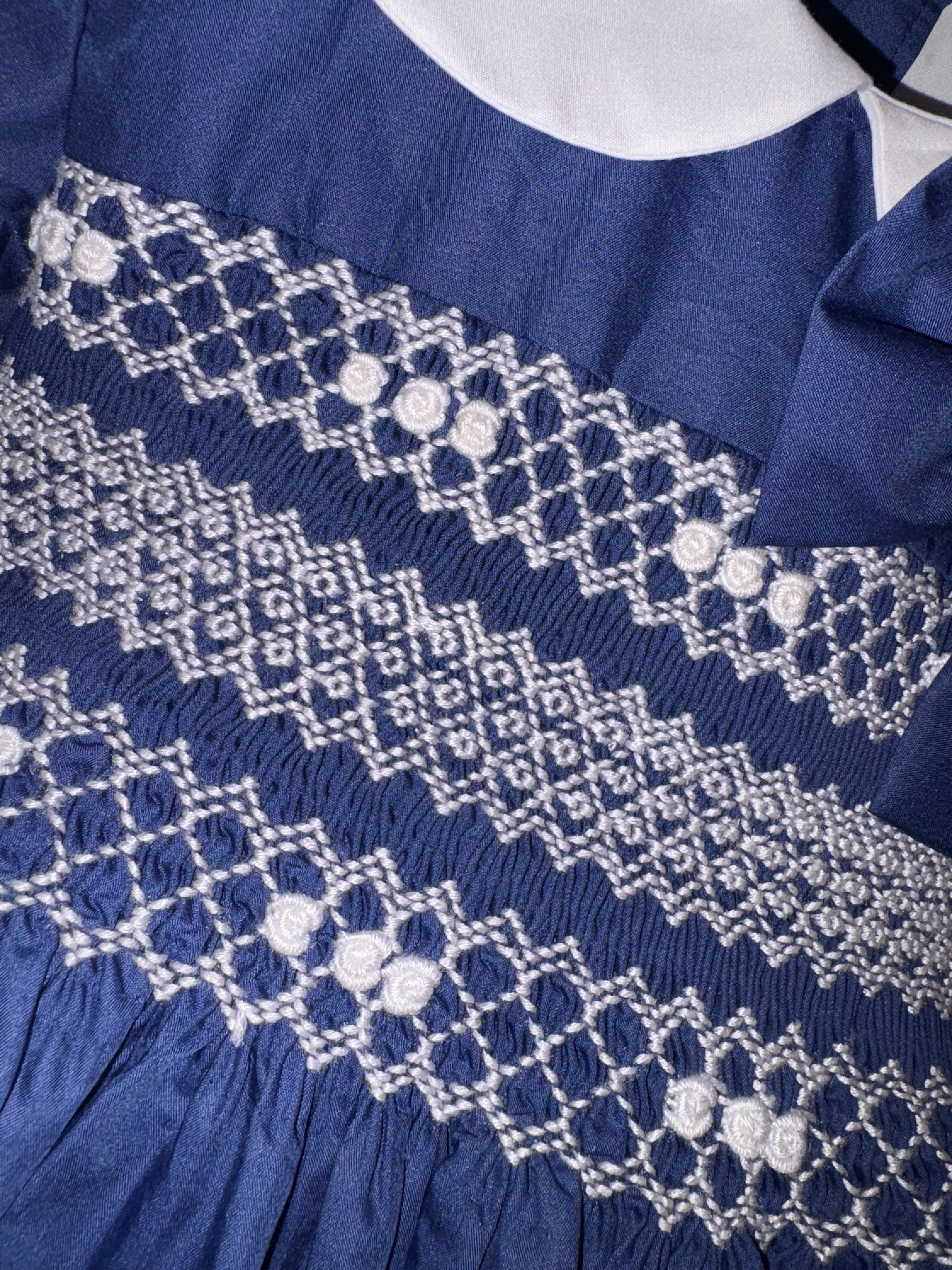 Navy smock dress with built in petticoat matching knickers